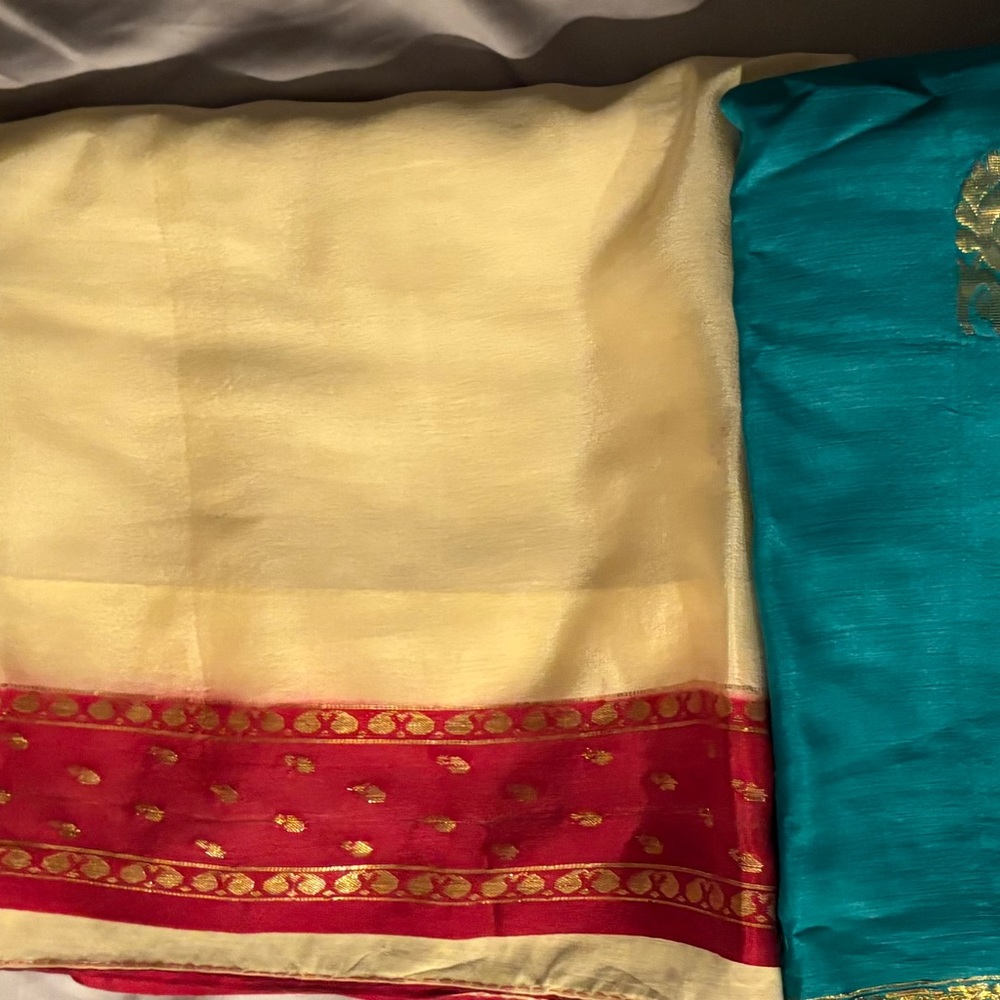 Two gently used silk sarees.